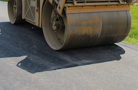 Pavage et construction de rue Pointe-Claire