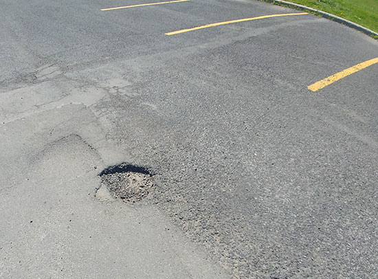 Réparation nids de poule et fissures Lasalle