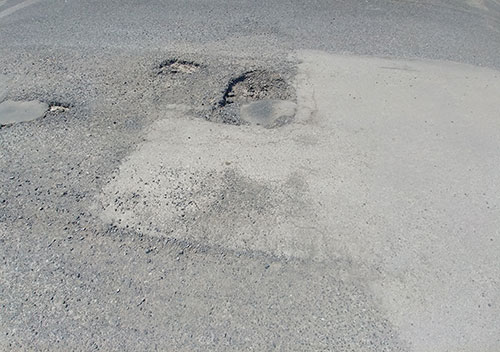 Réparation nids de poule et fissures Pointe-Claire