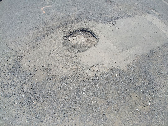 Réparation nids de poule et fissures Rosemont