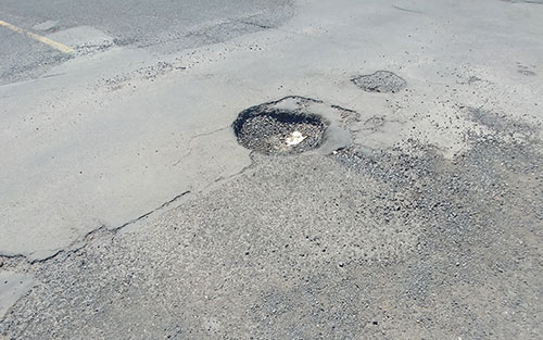 Réparation nids de poule et fissures Saint-Eustache