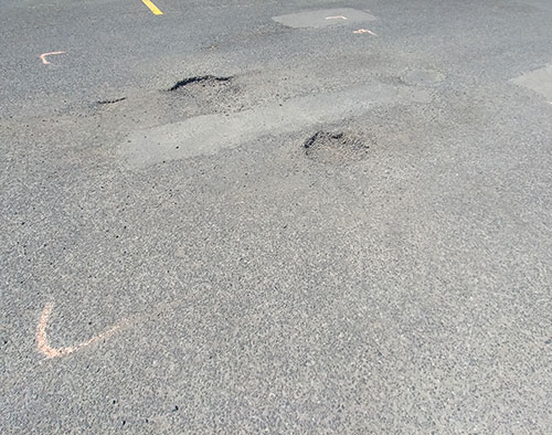 Réparation nids de poule et fissures Saint-Lambert