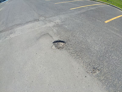 Réparation nids de poule et fissures Westmount